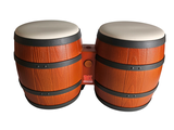 two wooden barrels sitting next to each other on a white surface