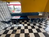 a black and white checkered floor in a restaurant