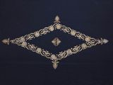 an image of a black and gold wallpaper with a design on it