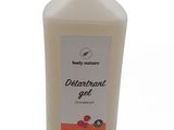 a bottle of deterant gel on a white background