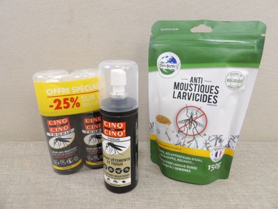 a bottle of insect repellent next to a bag of insect repellent
