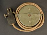 a close up of a hose connected to an electrical device
