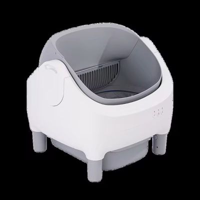 a white and gray toilet that is on a black background