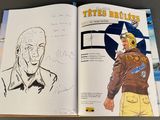 a book with a drawing of a man in a pilot ' s uniform