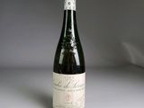 a bottle of wine that is sitting on a table