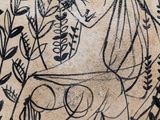 a black and white plate with a drawing on it