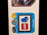 a box of lego star wars toys on a black background
