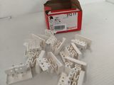 a box of white electrical parts sitting on a table