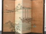 a screen with a painting of a boat in the water