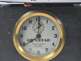a clock that is sitting on top of a table