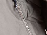 a close up of the zippers on a jacket