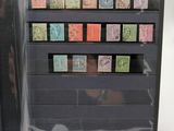 a picture of a display case with stamps on it