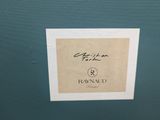the label on the back of a box of perfume