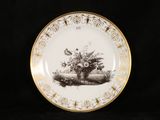 a plate with a picture of a basket of flowers on it