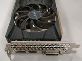 a close up of a video card sitting on top of a table