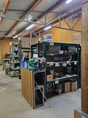 a room filled with lots of boxes and shelves