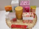 many different types of skin care products displayed on a tray