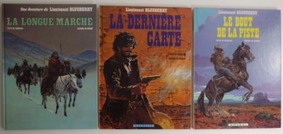 trois livres posés contre un mur, avec un cow-boy à cheval et un cow-boy à cheval