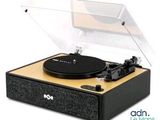 a close up of a record player on a white background