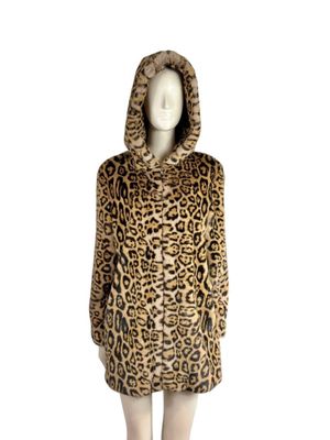 an image of a mannequin dressed in a leopard print coat