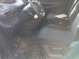 a picture of the inside of a car with the door open