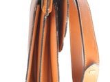 brown leather wallet with two zippers open on a white background