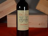 a bottle of wine that is sitting on a table