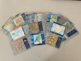 a lot of coins in the bags on the table