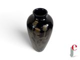 a black vase sitting on a white surface with a white background