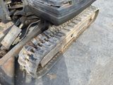 a close up view of a tractor tracks on the ground
