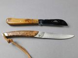 two different types of knives that are on the table