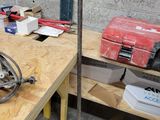 an image of a workbench with tools on it