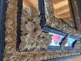 a mirror that is on the wall in the room
