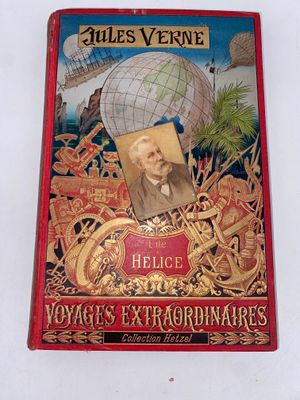 an old book with a picture of a man in a globe on it