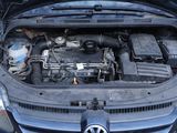 the engine of a car with its hood open and the hood up