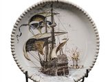 a plate with a picture of a ship on it