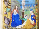 an old book with a painting of jesus on the cross