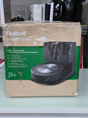 emballage d'un aspirateur robot posé sur un plan de travail de cuisine