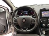 the interior of a car with a steering wheel, dashboard, and dash board
