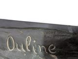 a close up of a baseball glove with the word out there written on it
