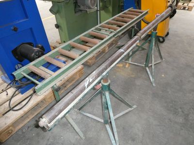 a machine that is working on a piece of wood