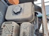 a pile of assorted items sitting on the ground
