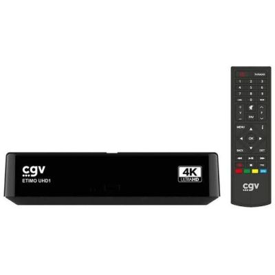 a close up of a remote control and a tv box