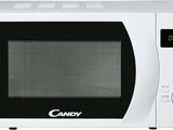 a white microwave with the door open on a white background