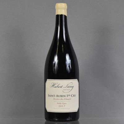 a bottle of wine that is sitting on a table