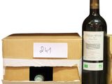 a bottle of wine and a box with a label on it