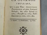 un livre ouvert sur lequel figure l'image d'un flocon de neige