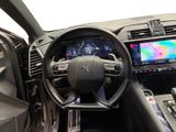 the interior of a car with a steering wheel and a dash board