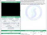 a close up of a document with a picture of a person on it