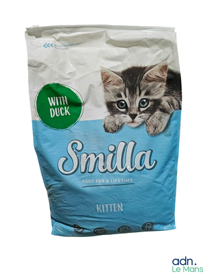 a bag of cat food that is sitting on a table
